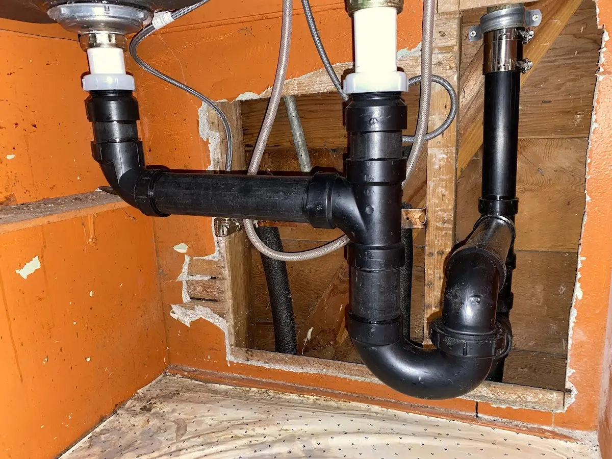 Professional Garbage Disposal Repair equipment and tools on the job in East Wenatchee